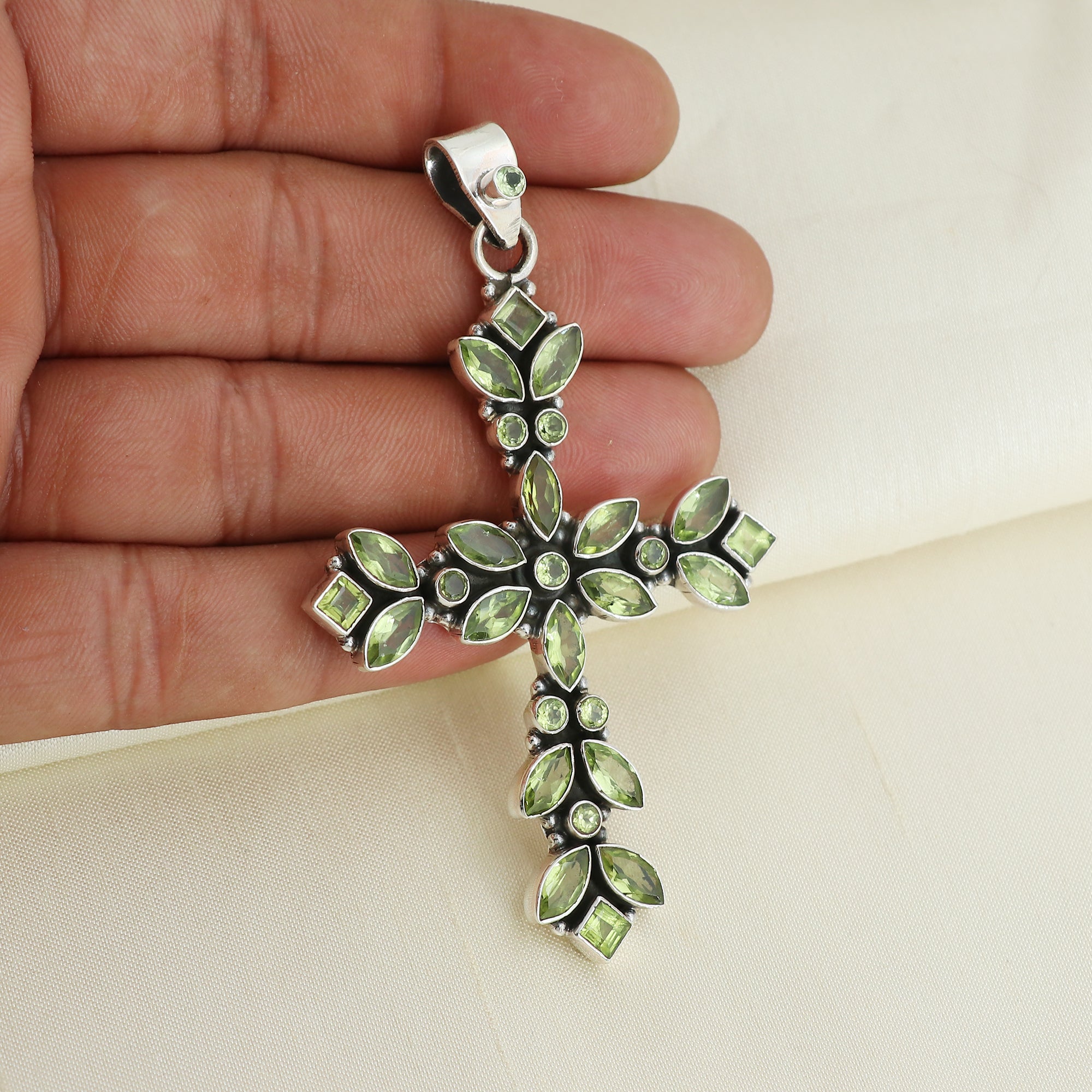 Designer Peridot Cross Pendant